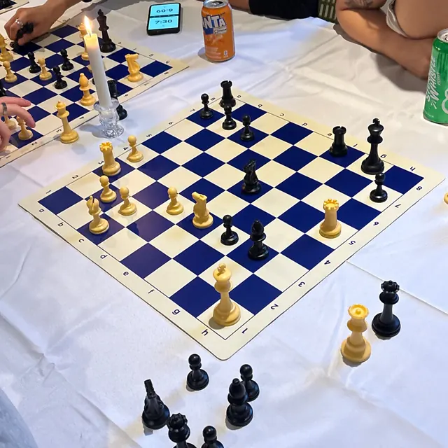 Photo of a blue vinyl board shot corner-on at a low angle