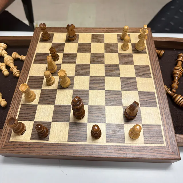 Photo of a walnut and maple board seen from the side